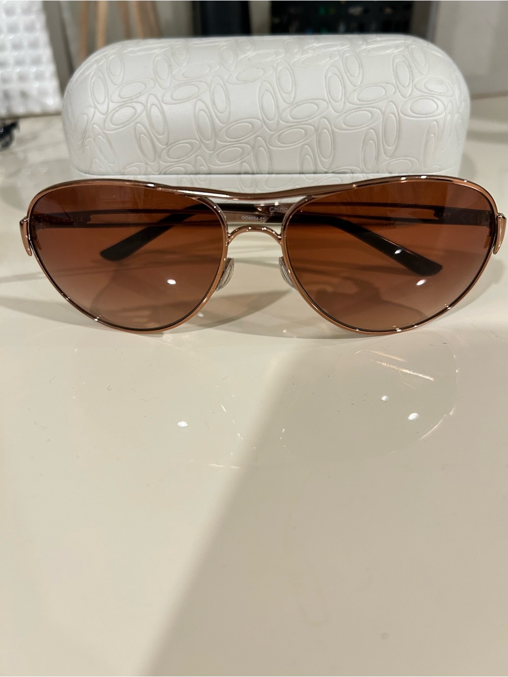 Oakley rose gold Aviator Sunglasses with Brown Lenses - Women Accessories